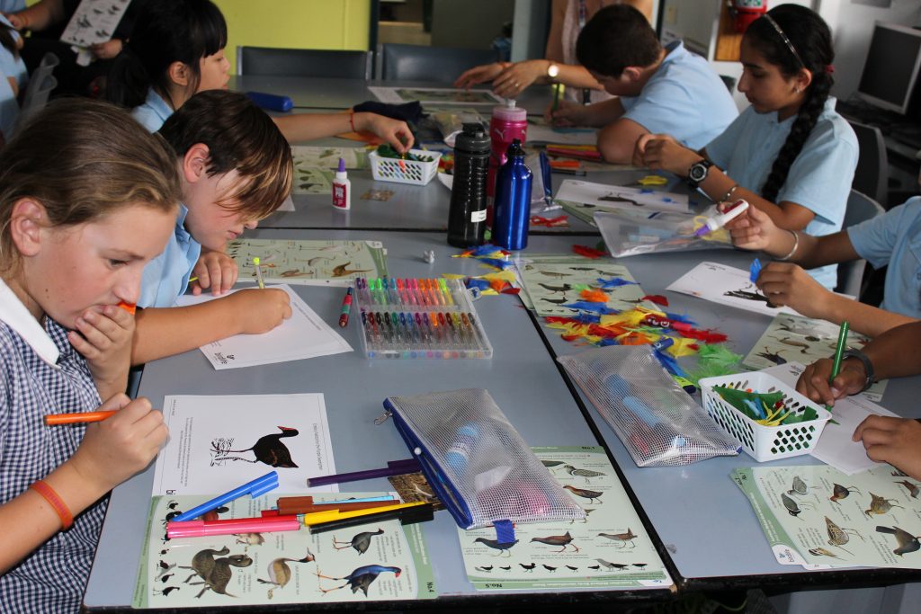 Children drawing birds